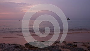 Panoramic view of beach Ras Umm El Sid. Beautiful sunrise over Red Sea with rocky shores, sandy beach with first rays of