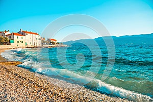 Panoramic view on a beautiful beach of a small town Postira - Croatia, island Brac