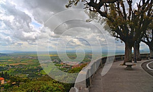 Panoramic view of beautiful landscape from terrace park in Cortona, medieval town in Tuscany, Italy