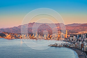 Panoramic View of Benidorm beach at sunrise. Famous Spanish holiday city