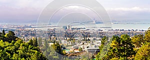 Panoramic view of Berkeley; San Francisco Bay shoreline with Port of Oakland, Yerba Buena Island, Treasure Island, the Bay bridge