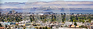 Panoramic view of Berkeley; San Francisco, Treasure Island and the Bay bridge visible in the background; California photo