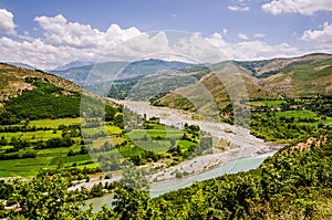 Panoramic view on Black Drin river in Albania in summer photo