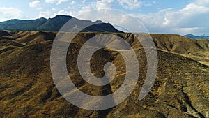 Panoramic view of Black Sea coastline mountains and yellow hills on a sunny autumn day, hiking and nature concept. Shot