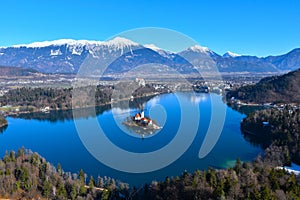 Panoramic view of Bled lake and Karavanke mountains in Gorenjska, Slovenia photo