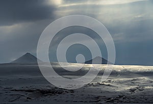 Panoramic view of Blue hour of the mountains, snow and Sea in Svalbard, Norway.