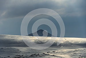 Panoramic view of Blue hour of the mountains, snow and Sea in Svalbard, Norway.