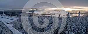 Panoramic view from Borowa Gora view point during winter time. Frosty structure, glazed, icy branches