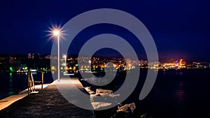 Panoramic view from the breakwater, entrance to the Port of Rijeka..Night shoot, Rijeka, Croatia. photo