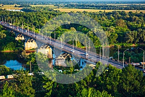 Panoramic view of bridge over river Klyazma in Vladimir city with railroad and green trees photo