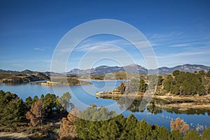 Panoramic view on a bright spring day of the Puentes reservoir, in Lorca, Murcia photo