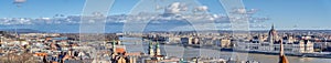 Panoramic view of Budapest Hungary Parliament by Danube river with clouds in winter morning