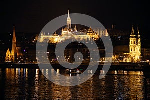 Panoramic view of Budapest by night with Danube river