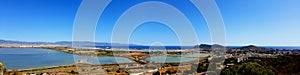 Panoramic view of Cagliari and salt pond from Monte Urpinu in a beautiful sunny day