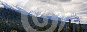 Panoramic view of the Canadian Rockies mountain peaks taken from