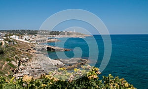 Panoramic view of the cape of Santa Maria di Leuca and its lighthouse in Puglia, Italy.