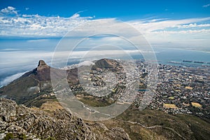 Panoramic view of Cape Town, Lion`s Head and Signal Hill from the top of Table Mountain