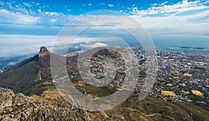 Panoramic view of Cape Town, Lion`s Head and Signal Hill from the top of Table Mountain