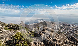 Panoramic view of Cape Town, Lion`s Head and Signal Hill from the top of Table Mountain