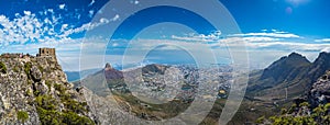 Panoramic view of Cape Town, Lion`s Head and Signal Hill from the top of Table Mountain