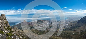 Panoramic view of Cape Town, Lion`s Head and Signal Hill from the top of Table Mountain