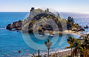 Panoramic view of Capo Taormina cape with Isola Bella island on Ionian sea shore in Messina region of Sicily in Italy