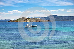 Panoramic view of Caprera Island and Spiaggia di Cala Portese harbor at the Tyrrhenian Sea coastline in Sardinia, Italy