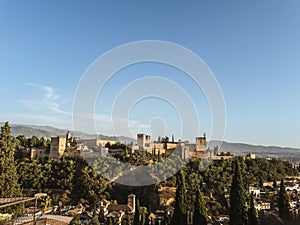 Panoramic view of the castle Alhambra in Granada, Andalusia, Spain, during sunset, from the Mirador de San Nicolas