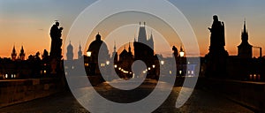 Panoramic view of Charles Bridge before dawn