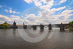 Panoramic view of Charles Bridge in Prague in a beautiful spring day. Selective focus with wide angle lens. Prague. Czech Republic