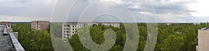 Panoramic view of the Chernobyl power station from the roof of an abandoned building.