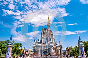 Panoramic view of Cinderella`s Castle on cloudy lightblue sky background  in Magic Kingdom at Walt Disney World Resort 2