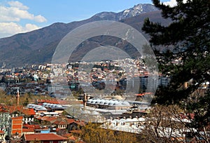 A panoramic view of the city of Bursa (Turkey) with many mosques, hans and Uludag mountain in the background