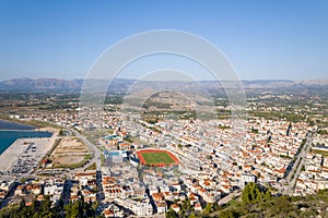 A panoramic view of the city center and arid countryside , Europe, Greece, Peloponnese, Argolis, Nafplion, Myrto seaside, in