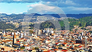 Panoramic view of the city Cuenca, Ecuador, with its many churches photo