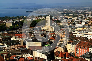 A panoramic view of the city of Lausanne, Lake Geneva and the mountains in the background
