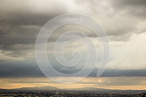 Panoramic view of the city of Monterrey, Nuevo LeÃ³n in MÃ©xico, its mountains and the clouds.