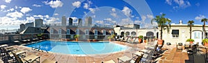 Panoramic view of city skyline from building rooftop. New Orleans attracts 15 million people annually