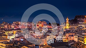 Panoramic view of the citylights of Corfu Town at night