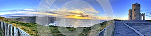 Panoramic view of the Cliffs of Moher at sunset.