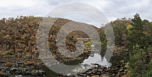 Panoramic view of cliffs and native tree park area at Cataract gorge national park, Launceston, Tasmania, Australia