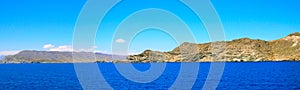 Panoramic view of the coasts of the islands of Tinos and Andros, in the Cyclades archipelago.