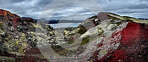 Panoramic view of colorful rhyolite volcanic mountains Landmannalaugar and Frostastadavatn Highland lake as pure wilderness in