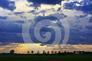 Panoramic view of colorful sunset over wetlands and meadows wildlife refuge by the Biebrza river in Poland