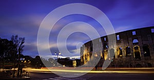 Panoramic view of Colosseum in the night at Rome, Italy