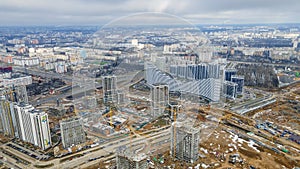 Panoramic view of construction of high-rise resedential buildings. Eye bird view of new resedential district.
