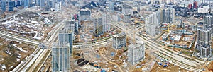 Panoramic view of construction of high-rise resedential buildings. View from above