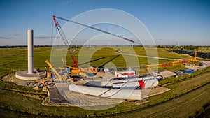 Panoramic view of the construction site of a modern wind turbine.