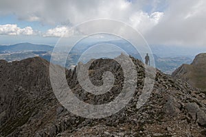 Panoramic view of the crest of Sirente massif in Abruzzo during cloudy day of summer photo