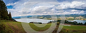 Panoramic view at Czorsztynskie Lake and Gorce Mountains seen from bicycle route Velo Czorsztyn, leading through the hills photo